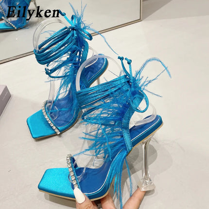 Eilyken Women’s Fuzzy Feather Transparent High-Heel Sandals