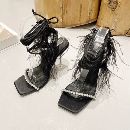 Eilyken Women’s Fuzzy Feather Transparent High-Heel Sandals