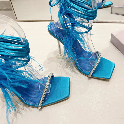 Eilyken Women’s Fuzzy Feather Transparent High-Heel Sandals