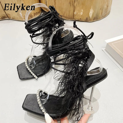 Eilyken Women’s Fuzzy Feather Transparent High-Heel Sandals
