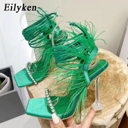 Eilyken Women’s Fuzzy Feather Transparent High-Heel Sandals