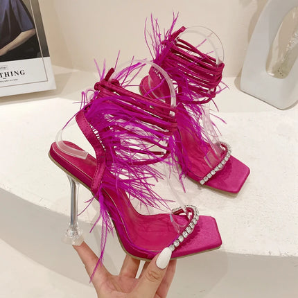 Eilyken Women’s Fuzzy Feather Transparent High-Heel Sandals