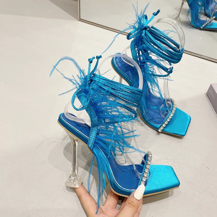 Eilyken Women’s Fuzzy Feather Transparent High-Heel Sandals
